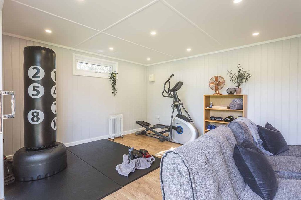 garden room interior with gym equipment