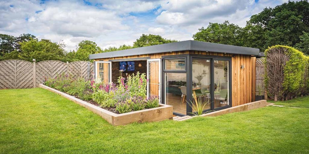 view of garden room within garden setting