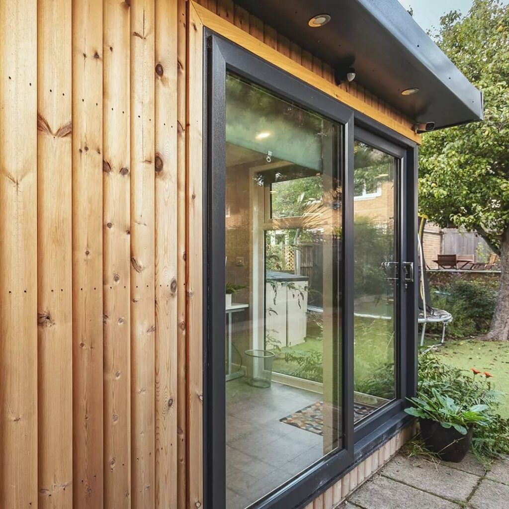 redwood clad garden room in garden